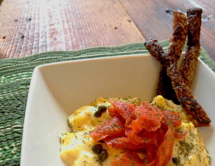 creamy eggs + tangy goat cheese + briny capers + salty salmon + crispy skin = yum!